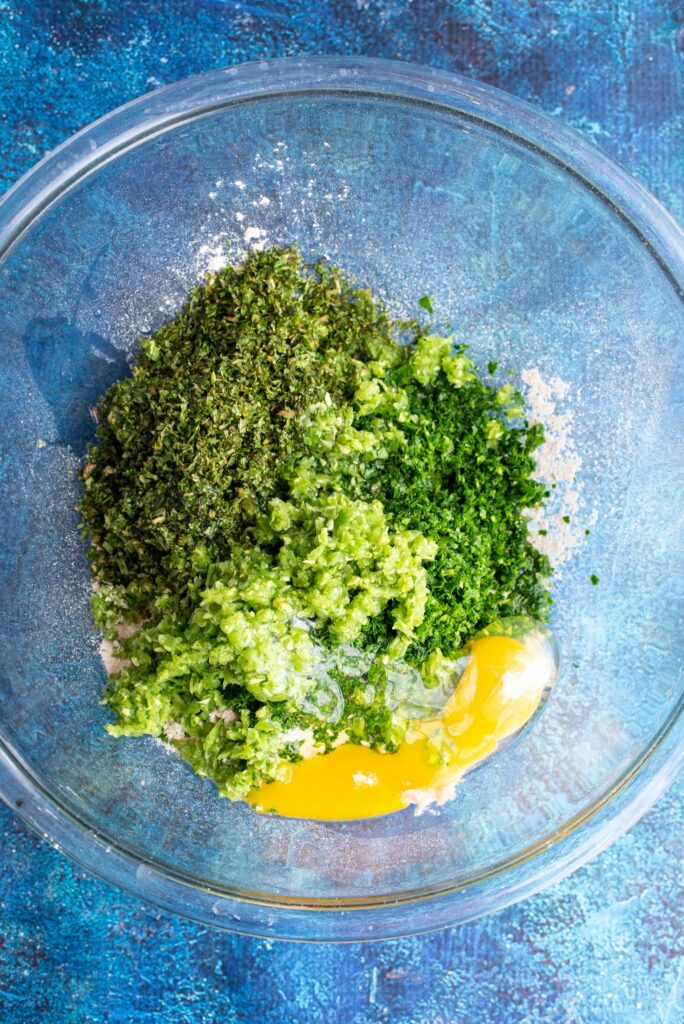 mixing bowl full of mint dog biscuit ingredients