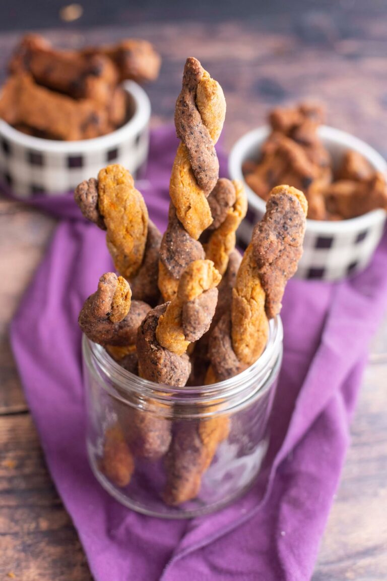 Blueberry Twist Dog Treats are the perfect healthy, homemade treats to spoil your pup with! Made with blueberry, carrots and oats, these baked cookies are packed with wholesome ingredients, incredibly easy to make, and fun for both you and your furry friend.