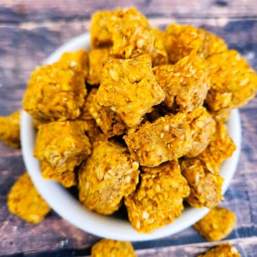 Finished pumpkin chamomile calming chews for dogs stacked and ready to serve as homemade anxiety treats